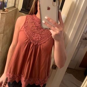 pink tank top with crochet detail